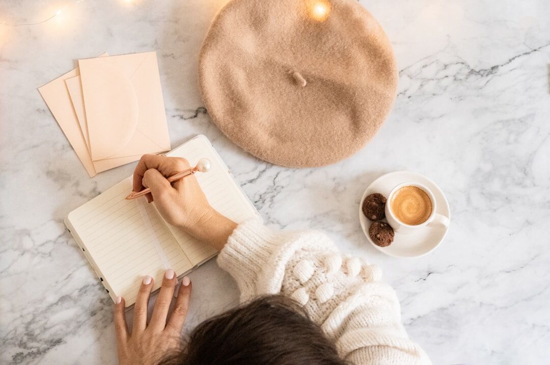 journalist writing in notebook