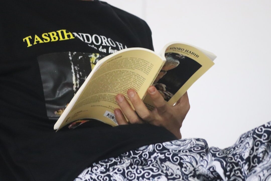 person reading magazine